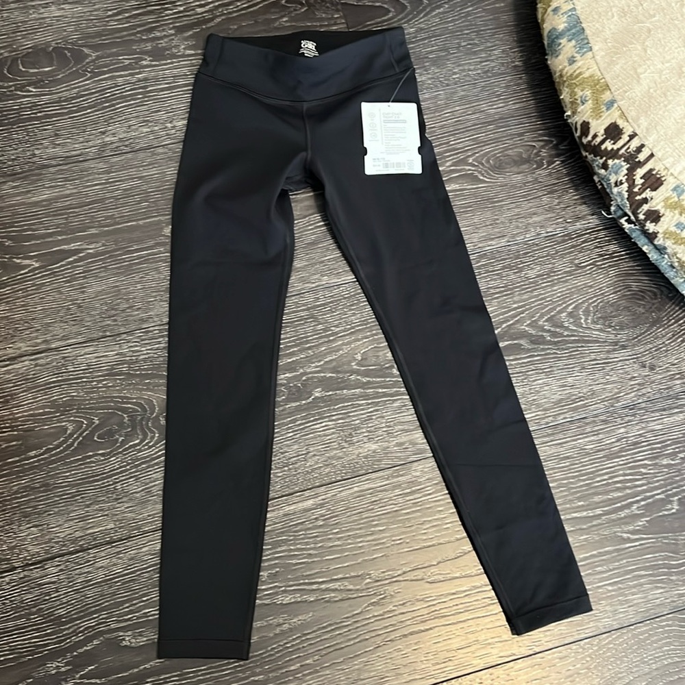 Athleta chit chat mid rise tights. New with tags. Youth med 8-10
